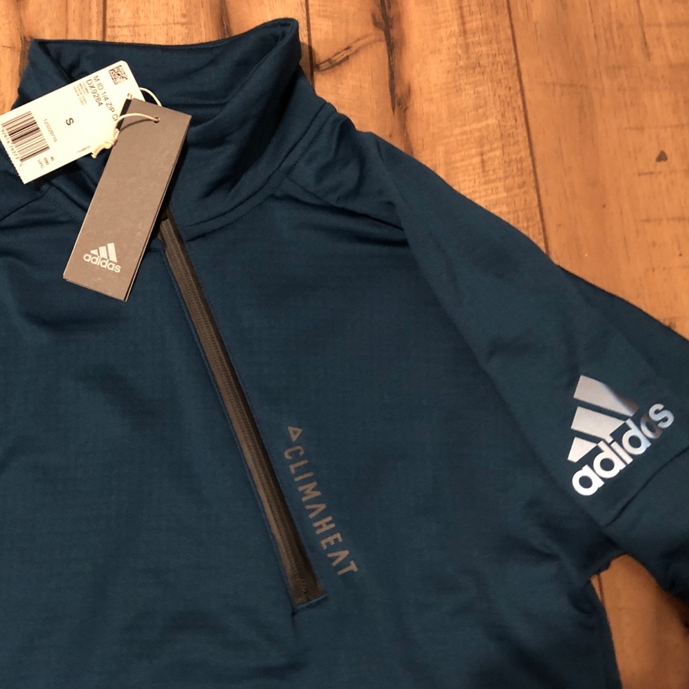 Stay warm in this Men's CLIMAHEAT adidas jacket